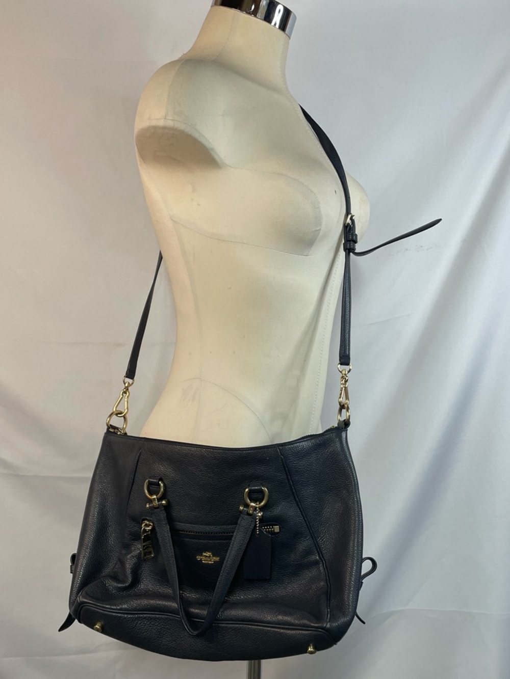 Coach black leather shoulder bag with gold accents. Very good shape!